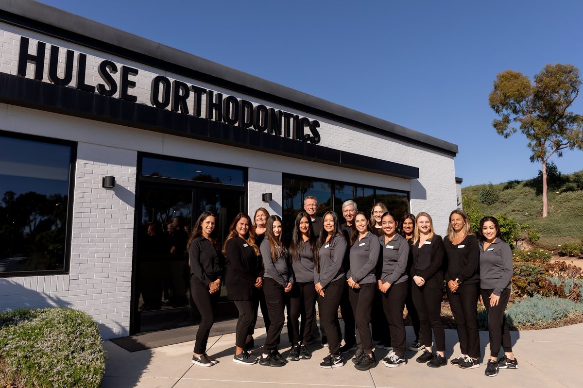 The Hulse Orthodontics team outside the practice on El Camino Real in Carlsbad, California